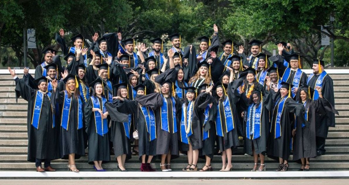 diverse graduate students graduating at university commencement