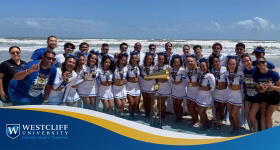 Westcliff University cheer team performing winning routine at NCA Championships in Daytona Beach Florida