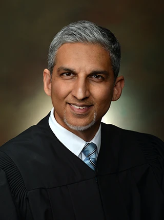 Justice Halim Dhanidina, Dean, Western State College of Law